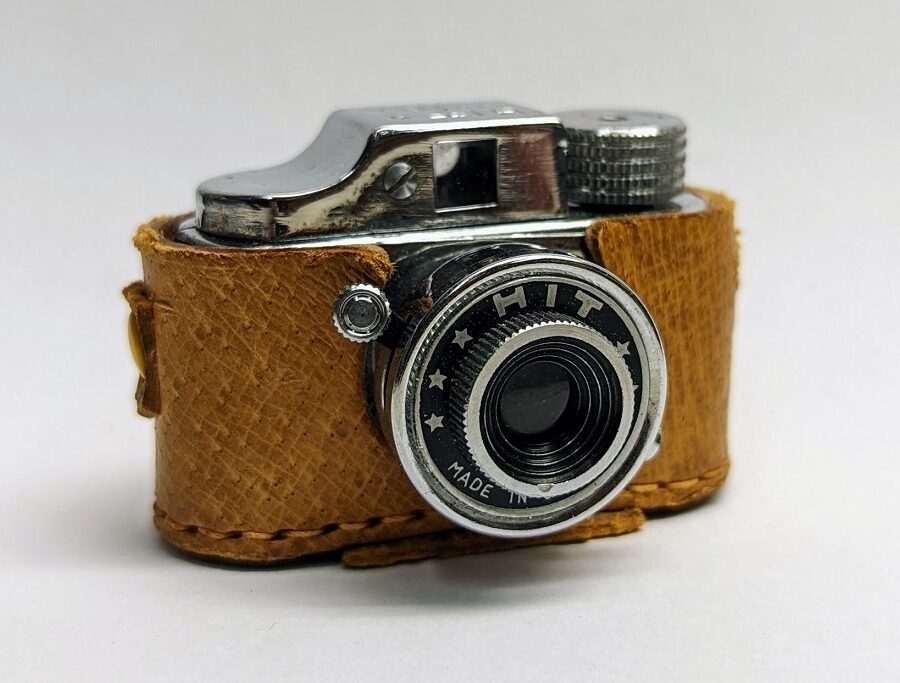 tiny camera in an open leather case